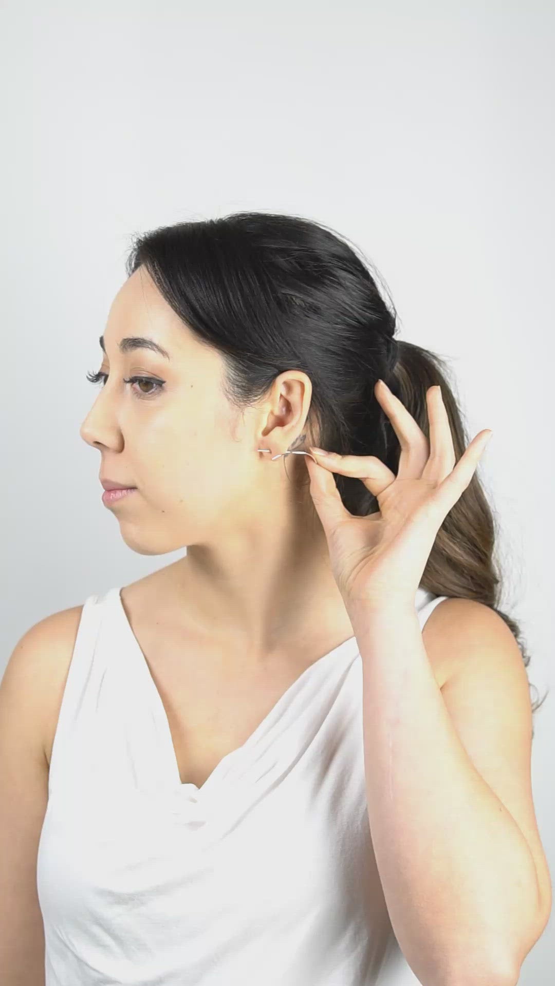 A video showing how to wear the Half Moon hoops in reverse style