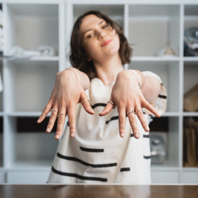 An image of the Everyday Bands and Tiny Rings in silver worn on the body