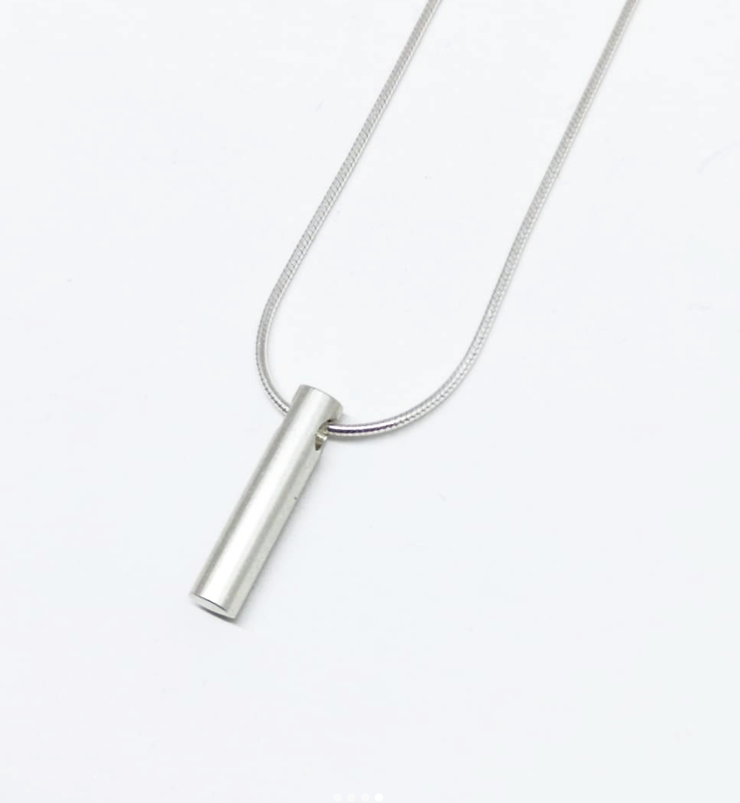 An alternate image of the Long Cylinder Pendant