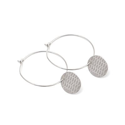 An image of the Silver Disc O Hoops with a lace imprint