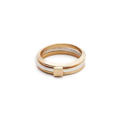 An image of Everyday Bands in gold stacked with a Tiny Ring