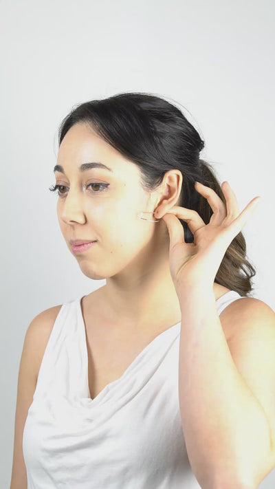 A video showing how to wear the Half Moon Hoops